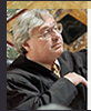 Alex Kozinski says: "My webpage is in my office, not here, at home... But it is connected to the Internet, of course.""